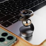 Technologisch accessoire in de vorm van een vergrootglas voor smartphone en computer, ideaal voor wetenschap en technologie.